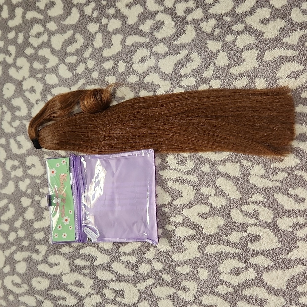 Insert name Here ponytail hair extension.